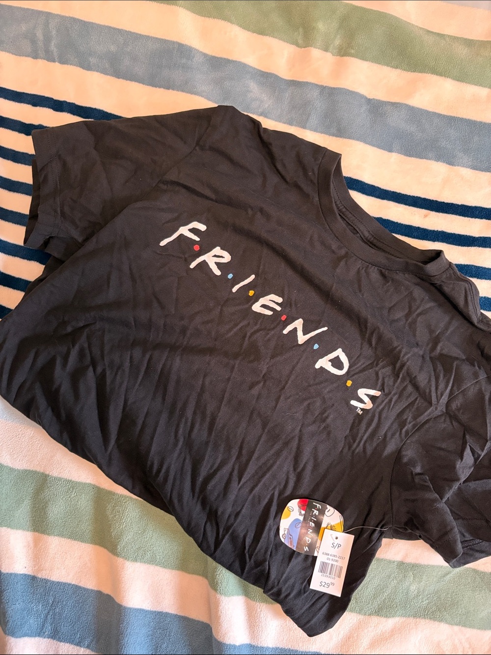 FRIENDS Black Tee with Multicolor Logo Tag